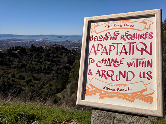 A certificate at a scenic outlook in the Oakland/Berkeley Hills overlooking the Bay Bridge in the distance